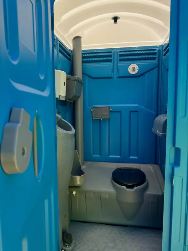 Interior of a blue portable toilet